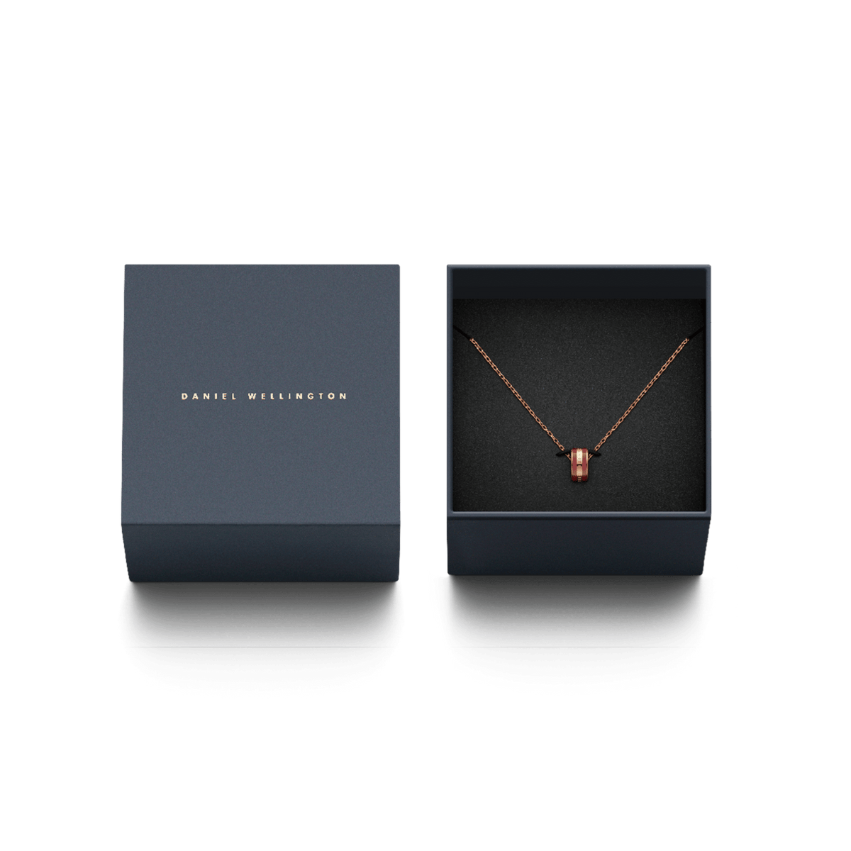 Collana Emalie Cherry Blush presentata nella confezione regalo Daniel Wellington, con scatola blu scuro aperta.