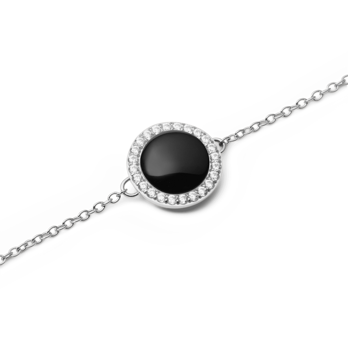 Close-up view of the Audrey Bracelet Black Agate Silver with a round black agate pendant, surrounded by sparkling white cubic zirconia crystals on a delicate silver chain.