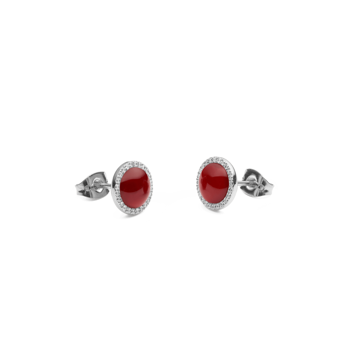 Audrey stud earrings made of stainless steel with round red agate and a silver border of white zirconia crystals, shown from a side view.