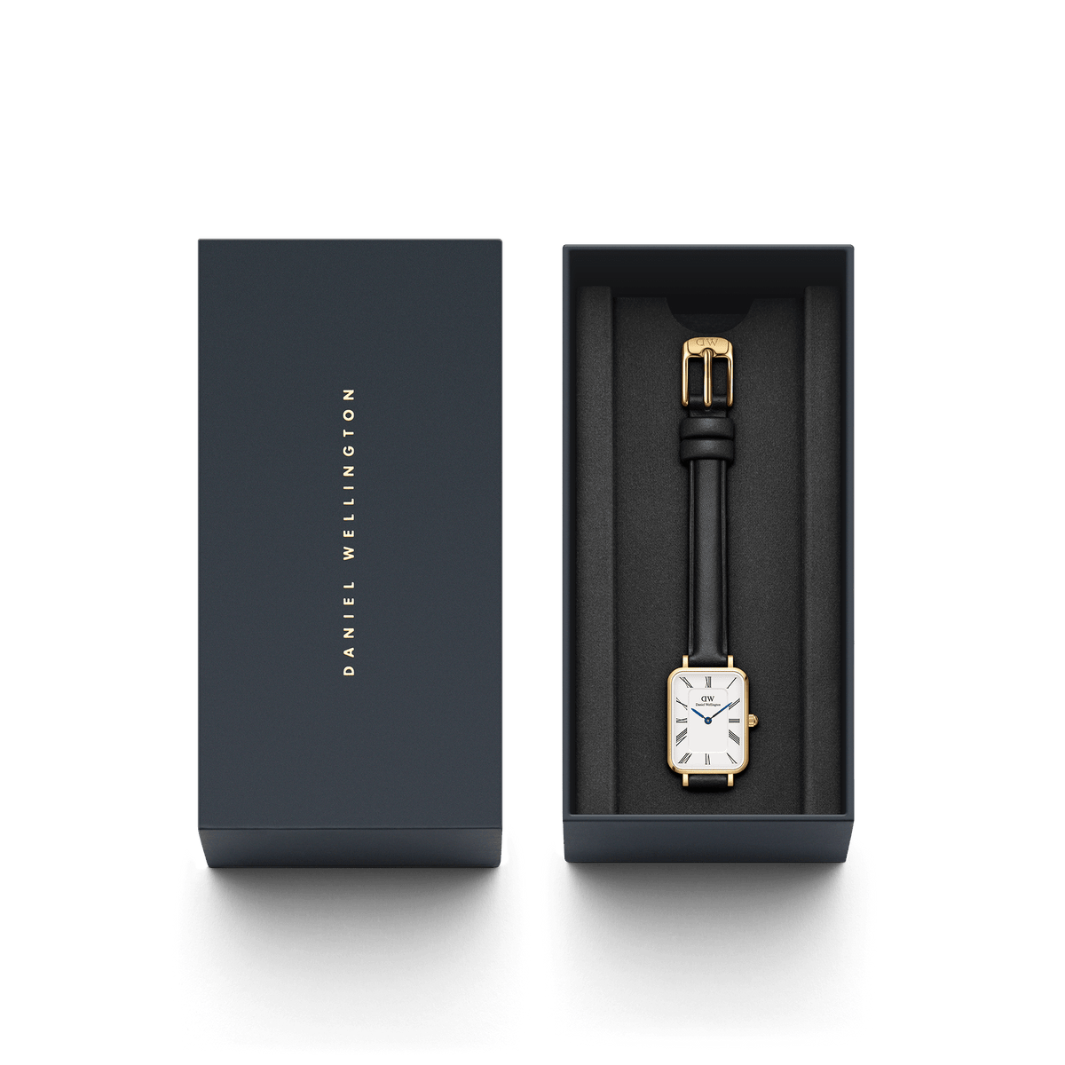 The Quadro Roman Numerals Sheffield Gold with a black leather strap and rectangular gold-coloured case is elegantly presented in a high-quality Daniel Wellington gift box.