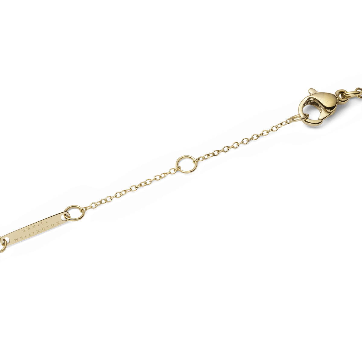 Close-up view of the adjustable lobster clasp on the Audrey Tiger Eye Gold necklace with a fine link chain and engraved brand tag.