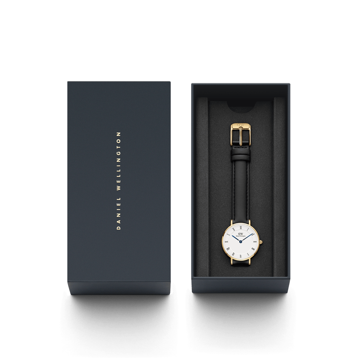 The Petite Roman Numerals Sheffield Gold ladies' watch by Daniel Wellington with black leather strap and gold-coloured case lies elegantly in a high-quality gift box.