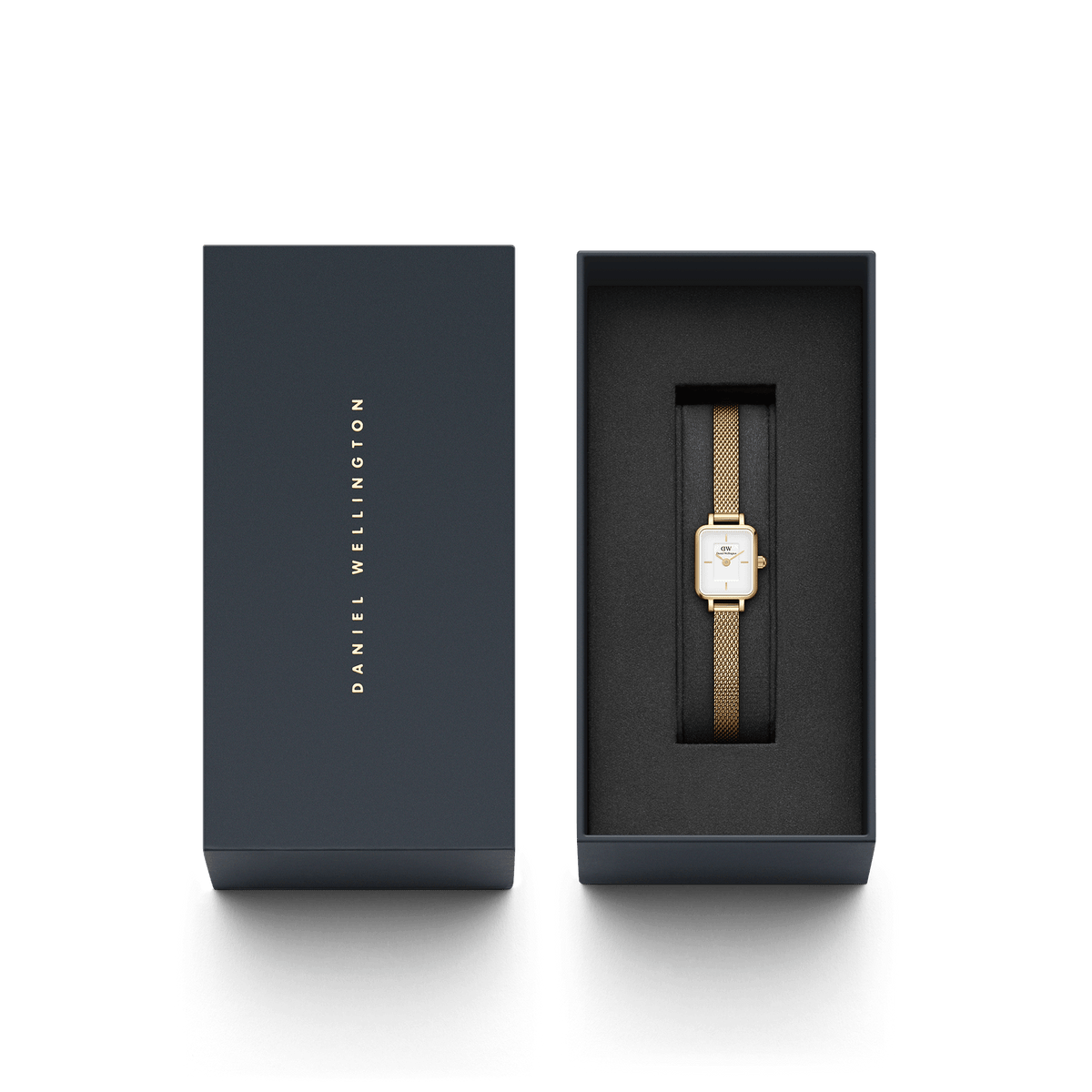 The Quadro Mini Evergold women's watch with a gold-coloured mesh strap and rectangular case is presented in an elegant Daniel Wellington gift box.