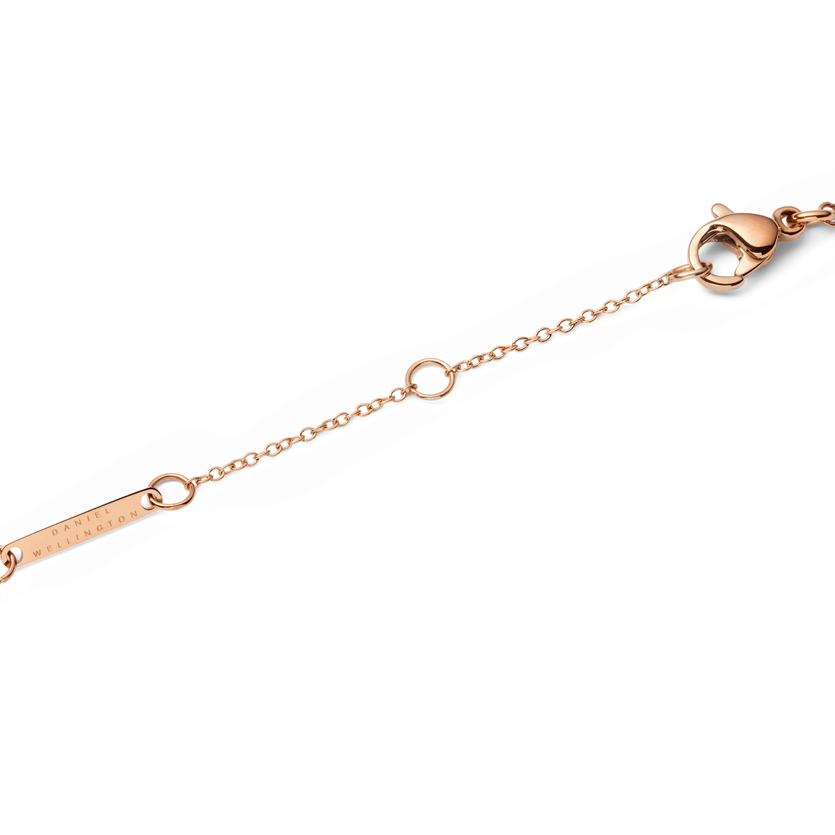 Adjustable clasp of the Audrey Necklace Jade Rose Gold made from delicate rose gold with a fine link chain and an engraved Daniel Wellington tag.