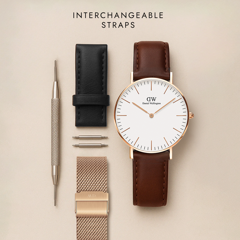 Daniel Wellington Classic Bristol watch with brown leather strap, strap changing tool, black leather strap, rose gold mesh strap, and spare spring bars, showcasing the interchangeable straps.