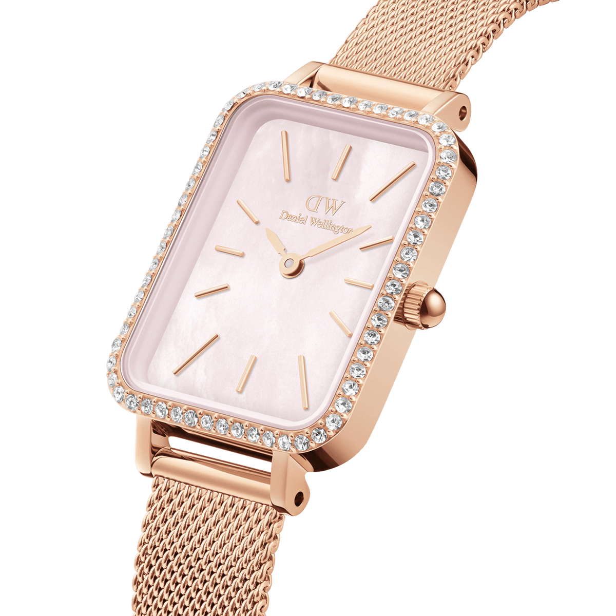 Close-up view of a rectangular ladies' watch in rose gold with a sparkling stone-set bezel, delicate pink mother-of-pearl dial, and fine mesh strap.