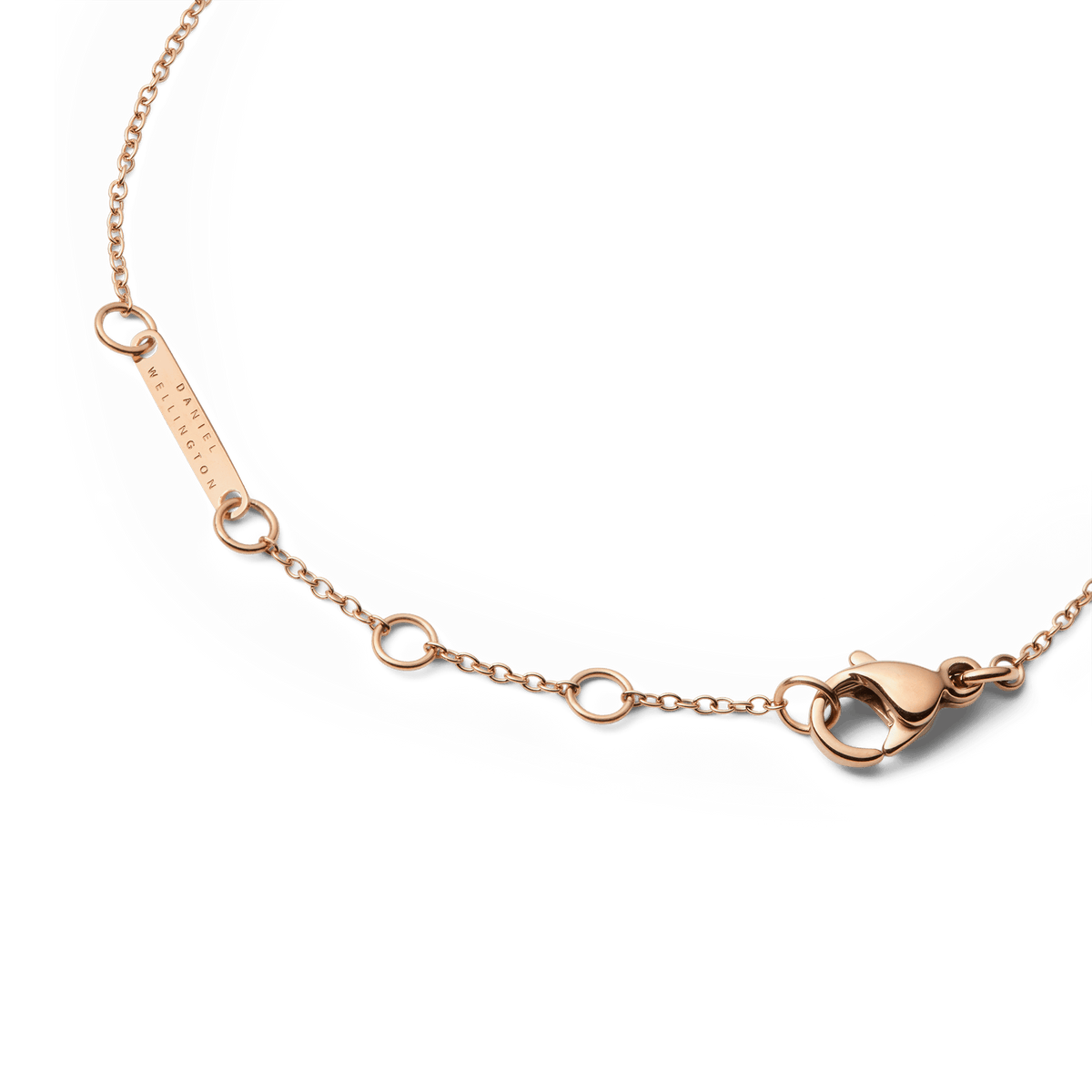 Close-up view of the adjustable lobster clasp and the fine rose gold chain of the Audrey Tiger Eye bracelet.