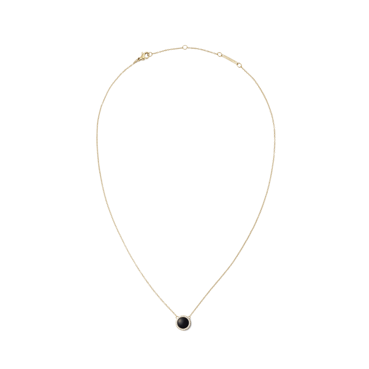 Delicate gold necklace with a round pendant made of black agate, framed by white cubic zirconia crystals.
