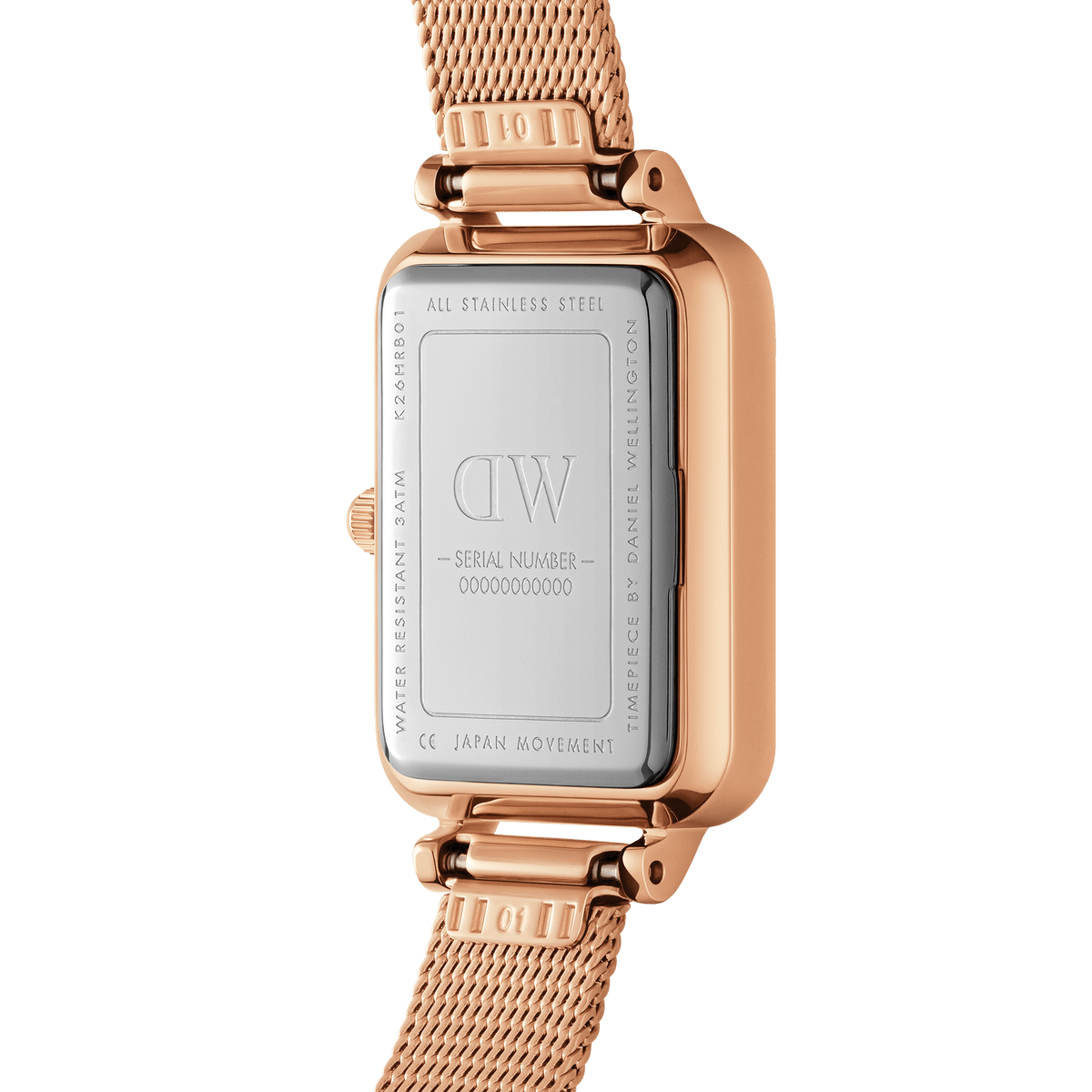 Back of the Quadro Roman Numerals Melrose ladies' watch with engraved stainless steel case back, visible serial number and rose gold mesh strap.