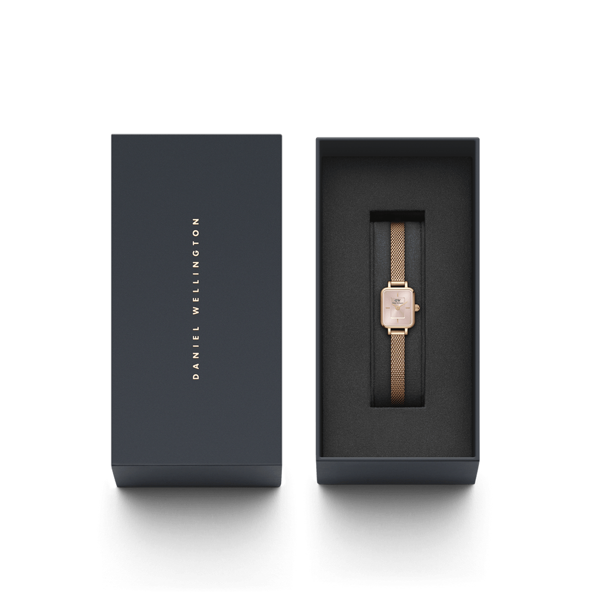 The Quadro Mini Melrose Blush women's watch with rose gold mesh strap and rectangular case is elegantly presented in a black gift box.