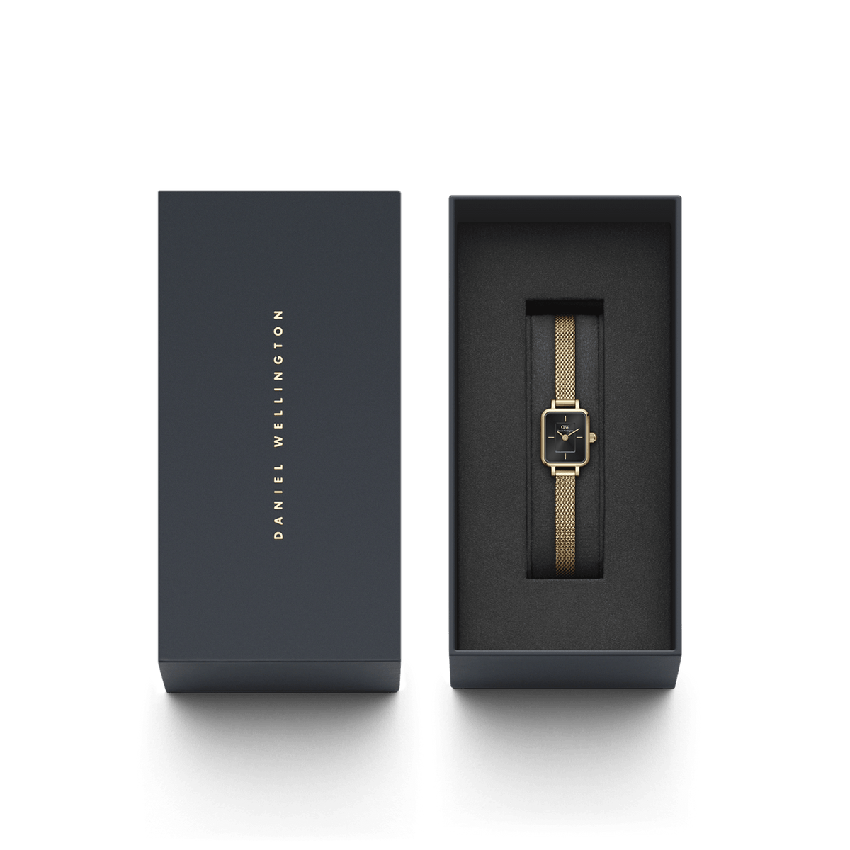 The Quadro Mini Evergold Onyx ladies' watch with gold-coloured mesh strap and black dial is elegantly presented in a high-quality, dark blue gift box from Daniel Wellington.