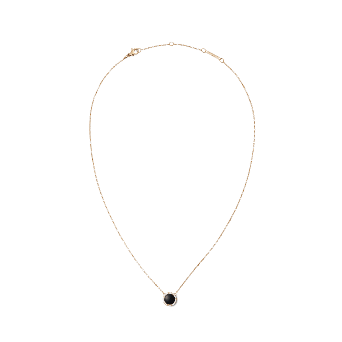 Delicate rose gold necklace with a round pendant, black agate gemstone and sparkling white zirconia crystals.