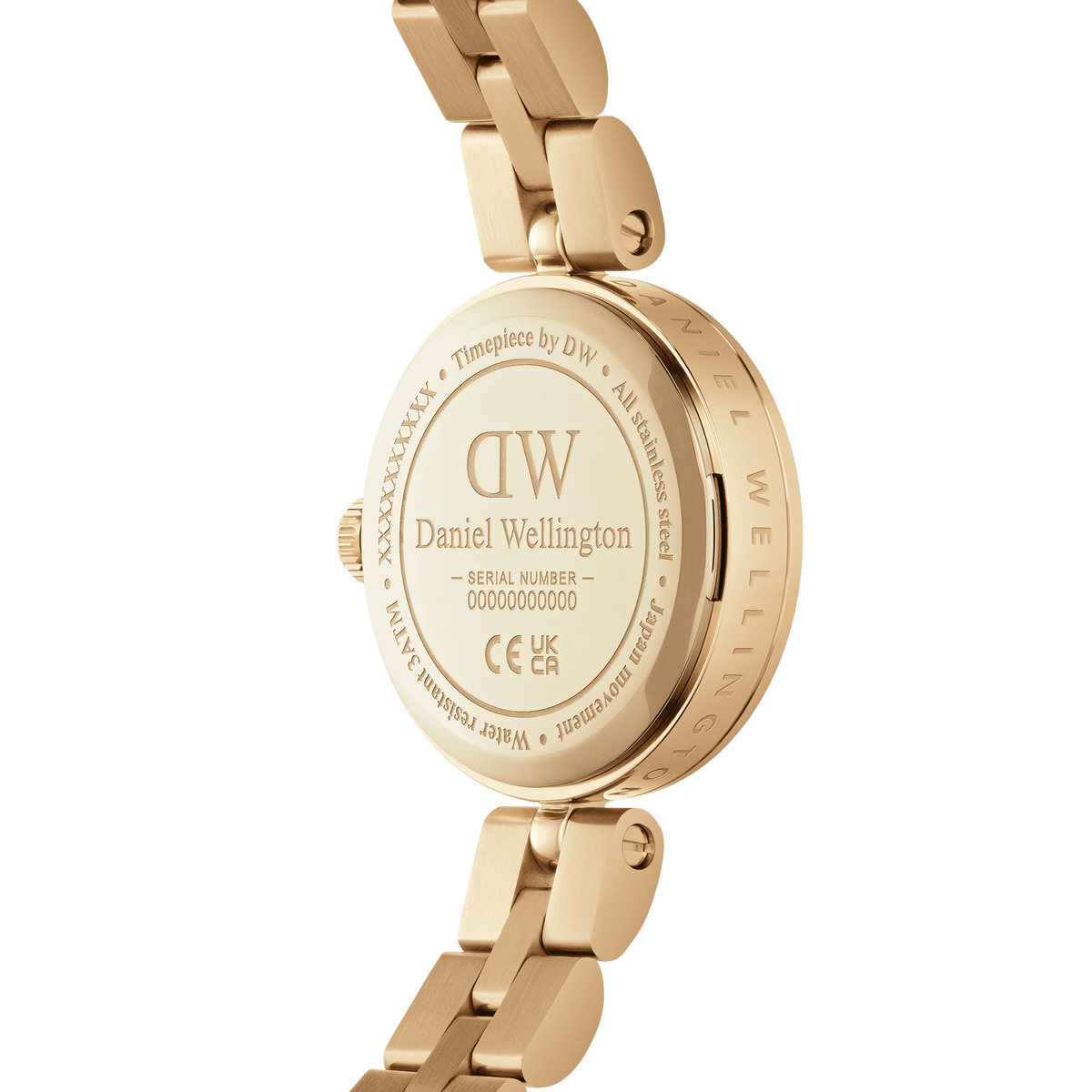 Fondello dell'orologio Elan Lumine Gold con incisioni Daniel Wellington, numero di serie e chiusura a farfalla a doppio pulsante laterale sul bracciale in acciaio placcato oro.