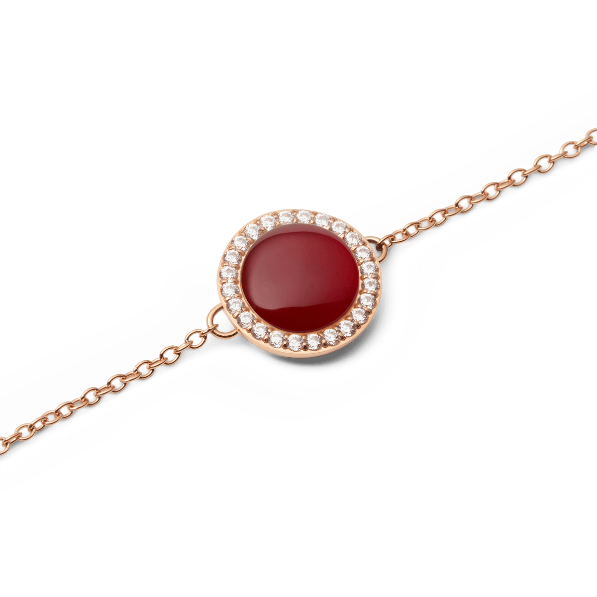 Close-up view of the Audrey bracelet in rose gold with a round red agate pendant, framed by sparkling white zirconia crystals on a delicate chain.
