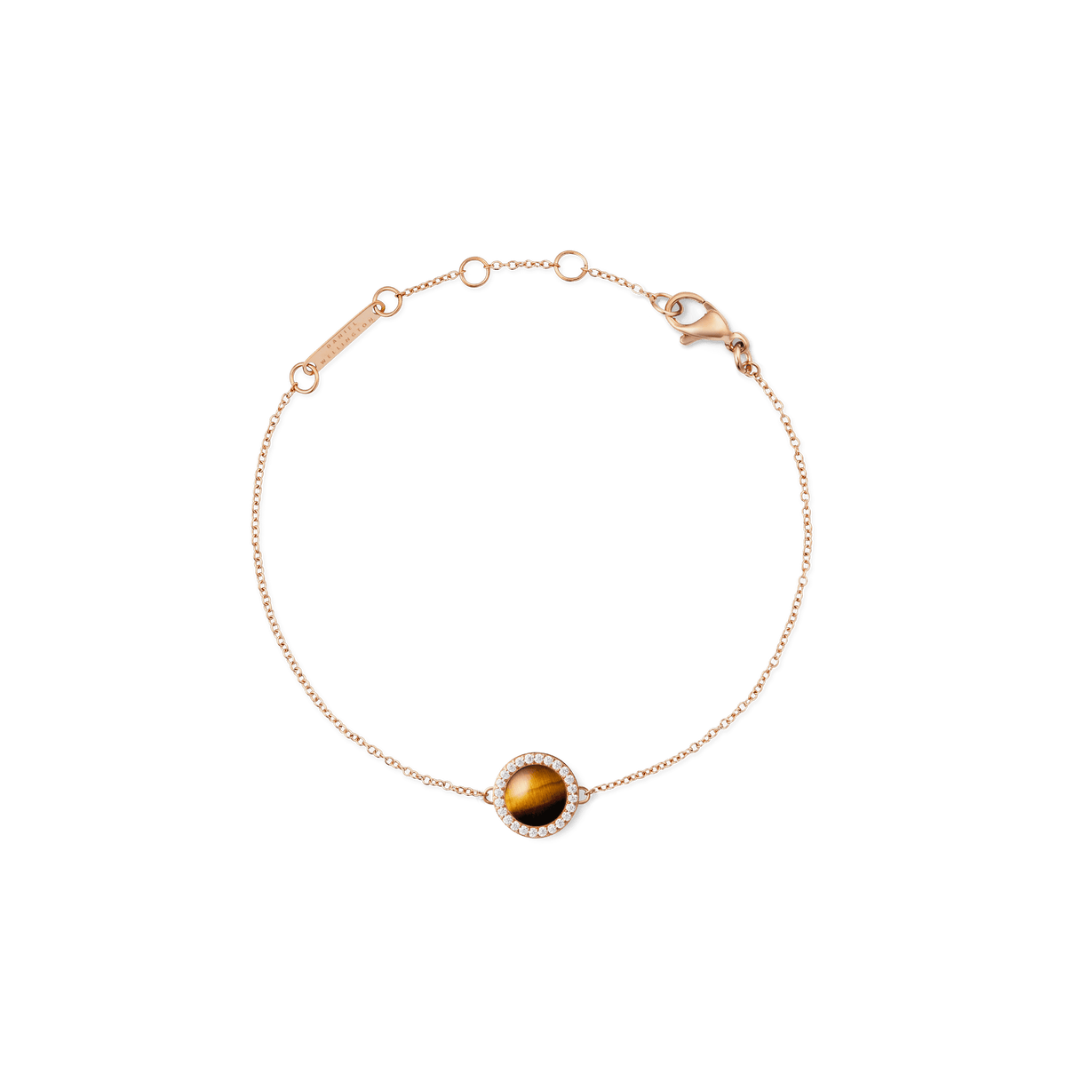 Delicate bracelet made of rose gold with a round tiger’s eye stone as the centrepiece, surrounded by white zirconia crystals and featuring an adjustable chain clasp.