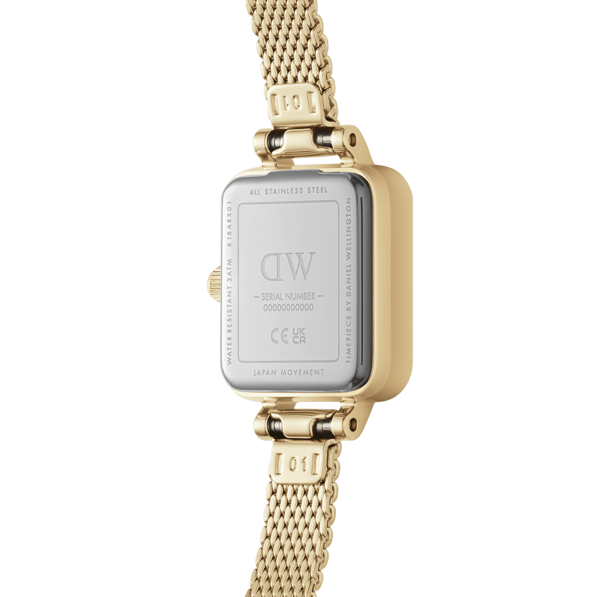 Back of the Quadro Mini Evergold Onyx ladies' watch with engraved stainless steel case back, gold-coloured case and fine mesh strap.