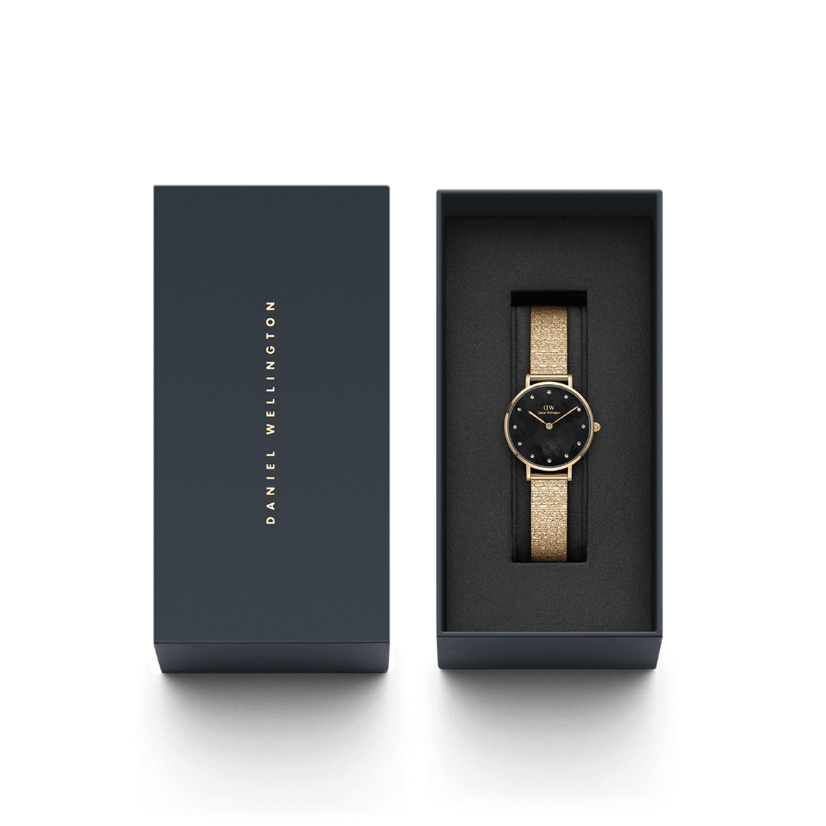 Petite Lumine Pressed Piano Gold women's watch with black mother-of-pearl dial and gold-tone link bracelet in an elegant Daniel Wellington gift box.