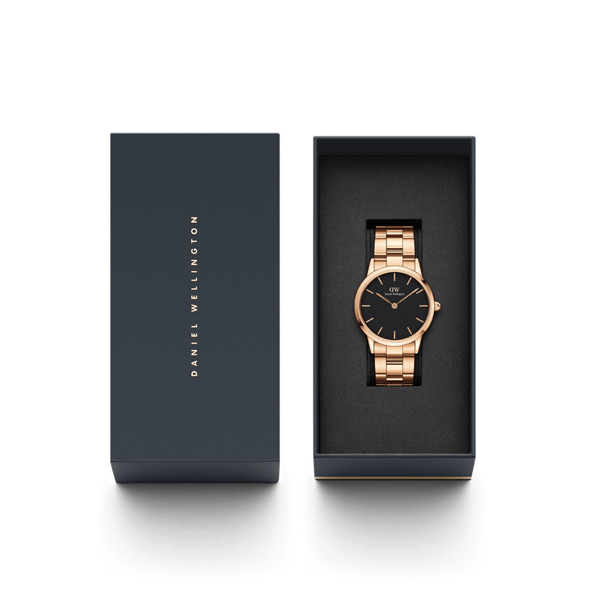 Rose gold Daniel Wellington Iconic Link ladies' watch with a black dial and stainless steel link bracelet, stylishly presented in an elegant gift box.