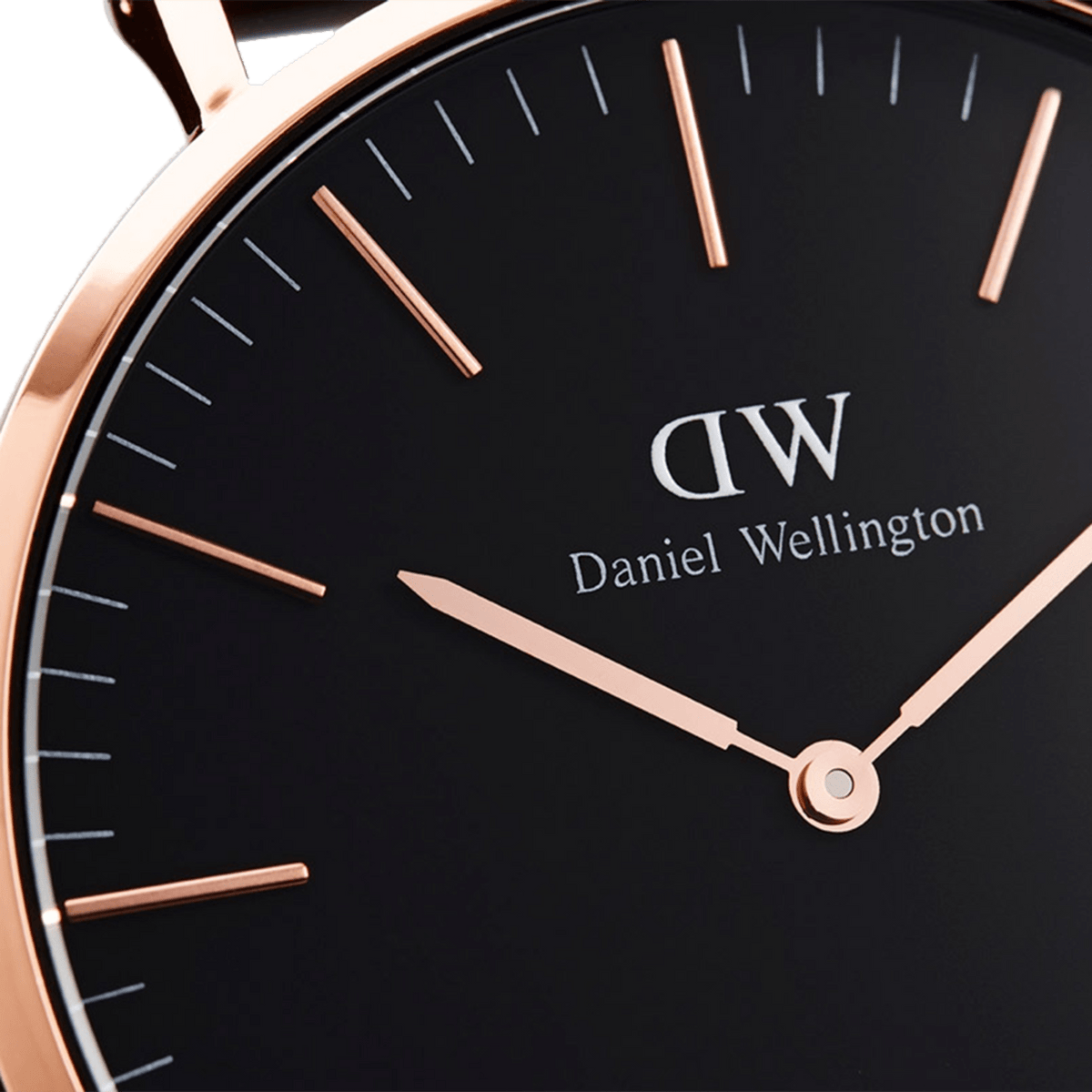 Close-up of the black dial of the Daniel Wellington Classic Reading with rose gold hands and indices in a slim stainless steel case.
