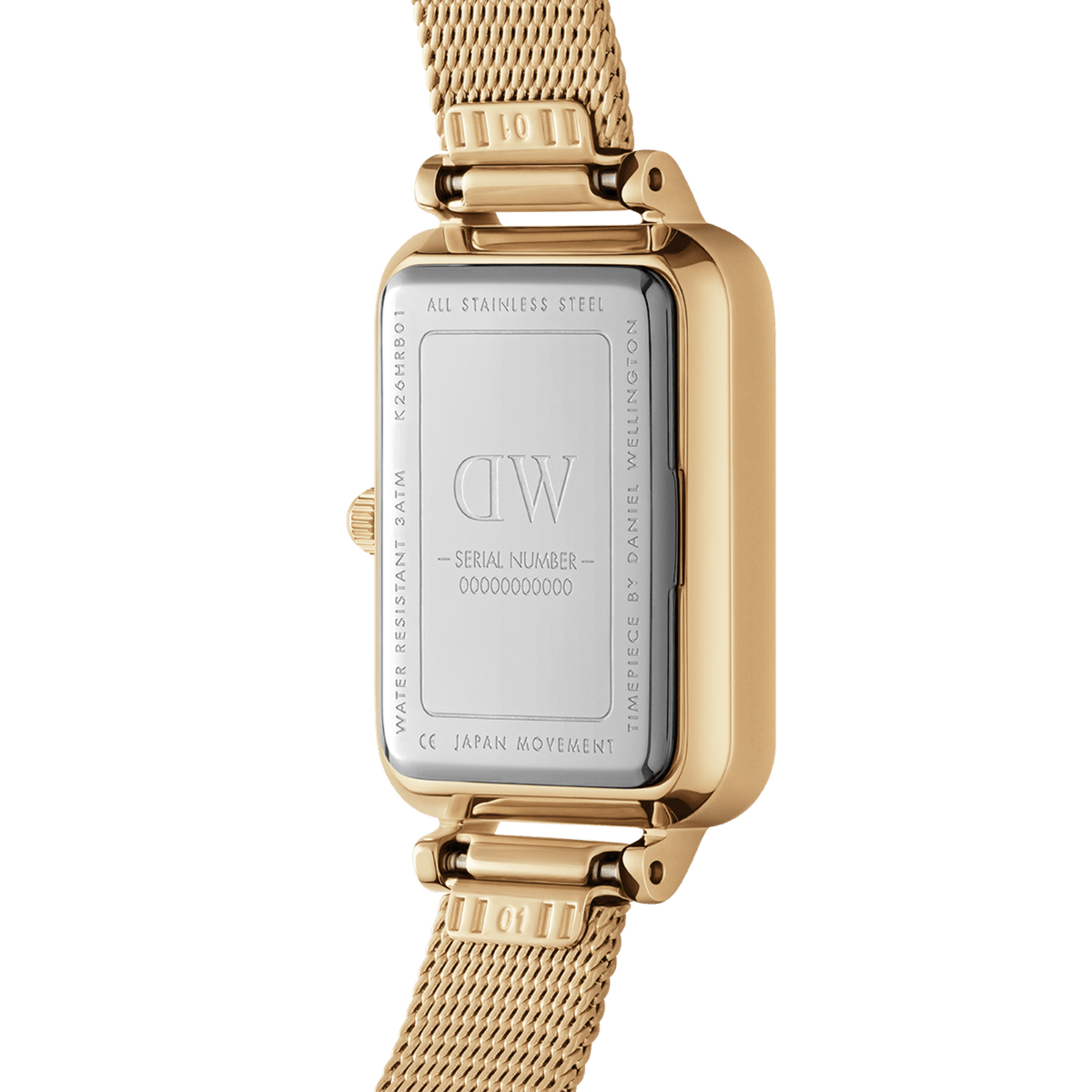 Back of the Quadro Pressed Evergold ladies' watch with engraved stainless steel case back, serial number and gold-coloured mesh strap.
