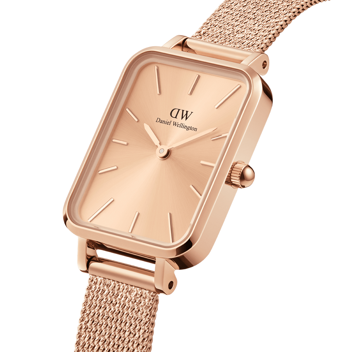 Close-up view of the Quadro Pressed Unitone women's watch in rose gold with a rectangular case, minimalist dial and fine mesh strap.