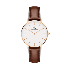 Petite St Mawes women's watch with a slim rose gold case, white dial, and elegant brown leather strap in a minimalist style.