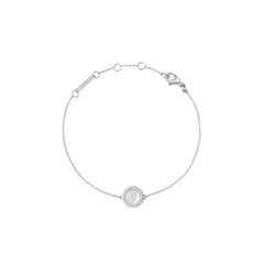 Delicate silver bracelet with a round mother-of-pearl pendant, surrounded by white cubic zirconia crystals and a lobster clasp.