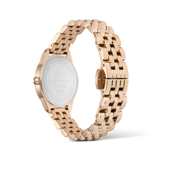 Rear view of the Ophelia Mini ladies' watch in rose gold with a polished stainless steel bracelet, visible case back, and open butterfly folding clasp.