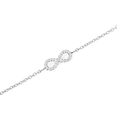 Dettaglio ravvicinato del simbolo dell'infinito del bracciale *Mirelle Infinity*, impreziosito da zirconi cubici bianchi incastonati lungo il profilo. La catena sottile in acciaio inossidabile argentato completa il design, mostrato su sfondo bianco.