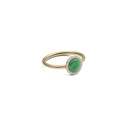 Delicate gold ring with a round green jade stone and a surrounding zirconia setting, designed in a minimalist and modern style.