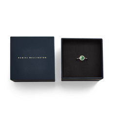 Audrey Ring Jade Gold with green jade stone and zirconia crystals in an elegant, dark blue Daniel Wellington jewellery box.