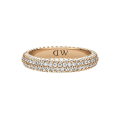 Slim gold ring with three rows of sparkling pavé crystals and a subtle DW engraving on the inside.