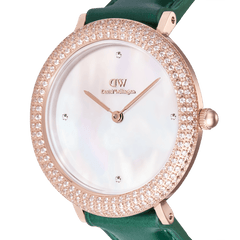 Close-up view of the Crystalline Bezel Green Croc Rose Gold ladies' watch with sparkling zirconia bezel, white mother-of-pearl dial and green leather strap.