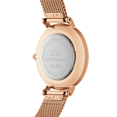 Back of the rose gold ladies' watch Petite Lumine Bezel Melrose Pink MOP with engraved case back and fine stainless steel mesh strap.