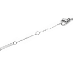 Close-up view of the adjustable lobster clasp of the Audrey Malachite Silver Necklace made of stainless steel, featuring a fine link chain and branded tag.