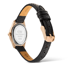 Retro dell'orologio **Ophelia Mini** che mostra il fondello inciso con il logo **Daniel Wellington**, la cassa in oro rosa e il cinturino intercambiabile in pelle nera, completo di passanti e fibbia placcata.