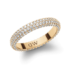 Elegant gold ring with sparkling pavé crystals in multiple rows and a discreetly engraved logo on the inside.