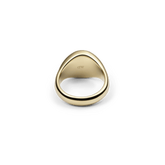 Inside of a classic gold stainless steel signet ring with a subtle Daniel Wellington logo and a high-quality, polished finish.