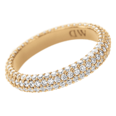Gold pavé crystal ring with multiple rows of sparkling stones and a subtle DW engraving on the inside.