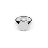 Polished silver signet ring made of stainless steel with a flat, round surface and a subtle, modern design.