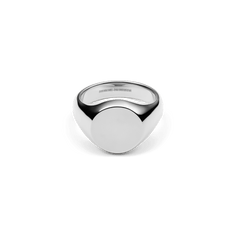 Polished silver signet ring made of stainless steel with a flat, round surface and a subtle, modern design.