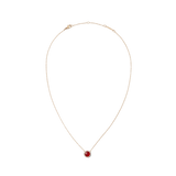 Delicate rose gold necklace with a round pendant made of red agate, framed by white zirconia crystals.