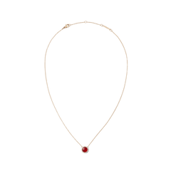 Delicate rose gold necklace with a round pendant made of red agate, framed by white zirconia crystals.