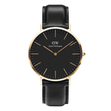 Minimalist Daniel Wellington Classic Sheffield Gold watch with black dial, gold-coloured case, and black leather strap.