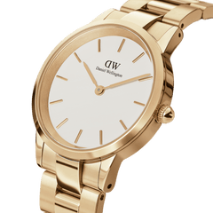Close-up view of the Daniel Wellington Iconic Link women's watch with a gold-coloured stainless steel bracelet, white dial, and minimalist gold indices.