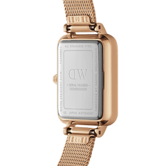 Back view of the Quadro Pressed Melrose Emerald women's watch with engraved stainless steel case back, serial number, and rose gold mesh strap.