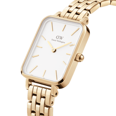 Close-up view of the Quadro 5-Link Evergold ladies' watch with a rectangular gold-coloured case, eggshell white dial, and elegant 5-link stainless steel bracelet.