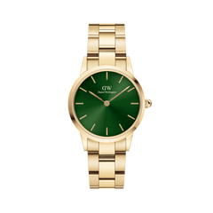 Elegant women's watch with gold-coloured stainless steel strap and emerald green dial, minimalist design and gold indices.